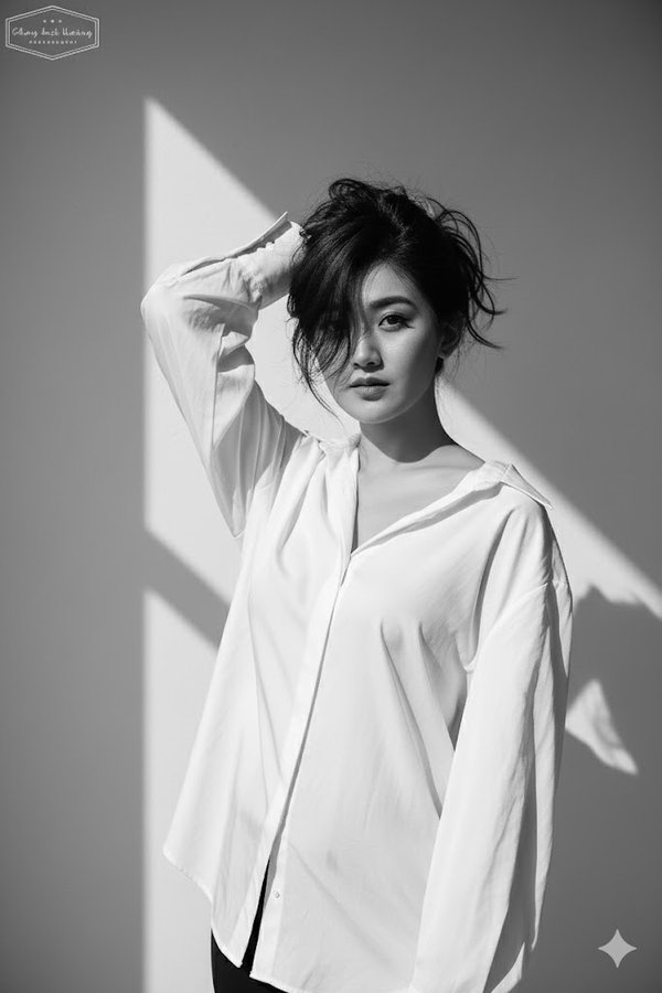 Portrait in an Oversized White Shirt