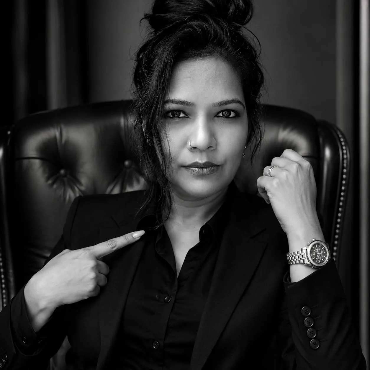 Create a black and white, photorealistic, 8K ultra-detailed, DSLR studio portrait, close-up.