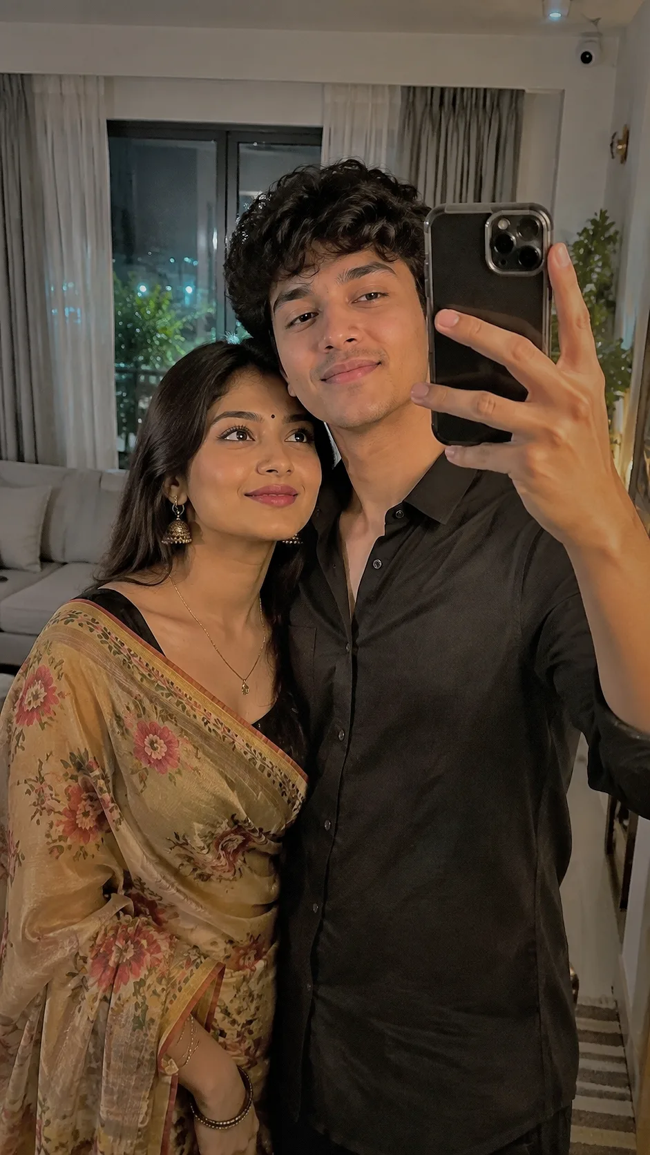 Create a highly realistic romantic indoor selfie of a young Indian couple together inside a beautiful cozy modern home.