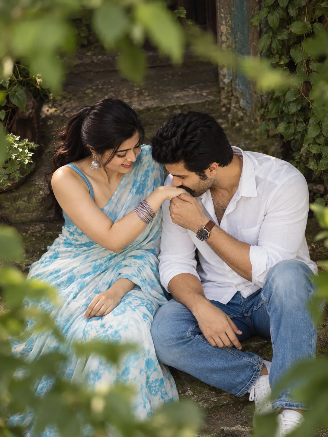 MAIN PROMPT Use the uploaded reference image as the primary visual reference for the couple's composition, intimate pose, hand interaction,