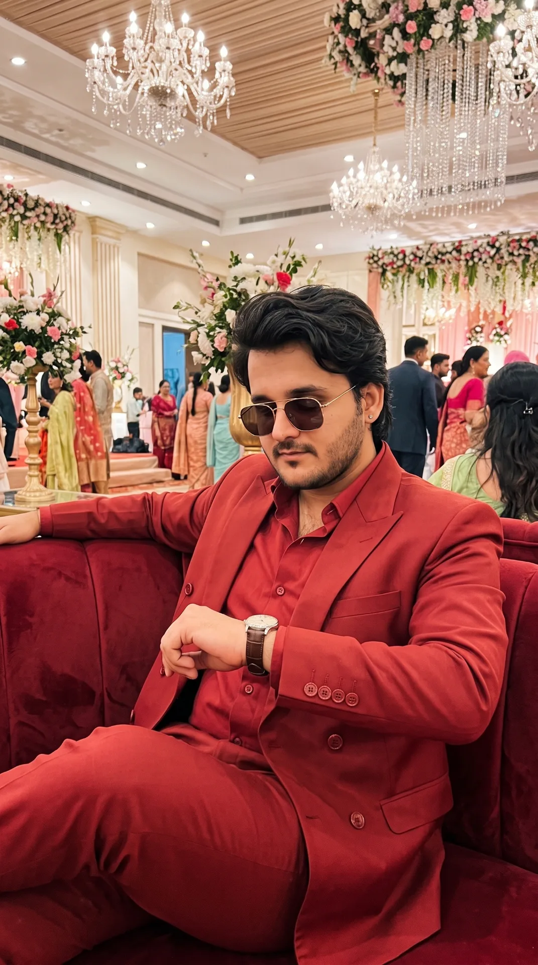 Ultra-realistic natural smartphone photography of a very handsome and attractive young man as reference image standing inside a venue.