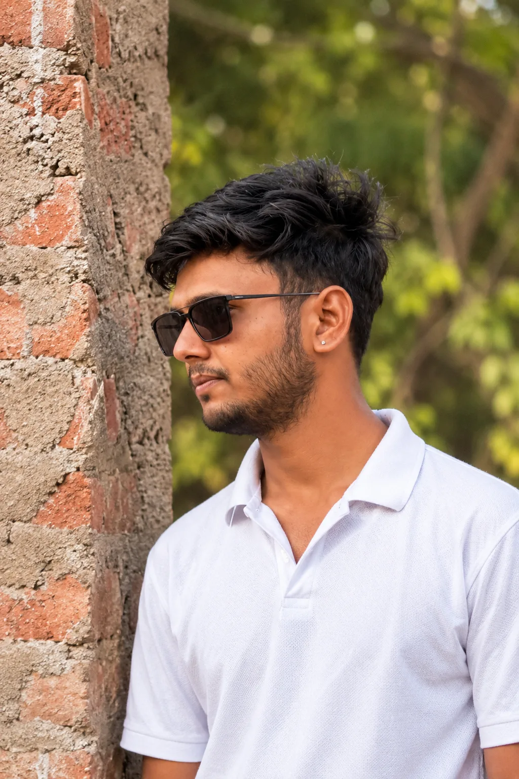 πΈ Exact Image Generation Prompt Create an ultra-realistic outdoor portrait of a young adult South Asian man, closely matching the uploaded