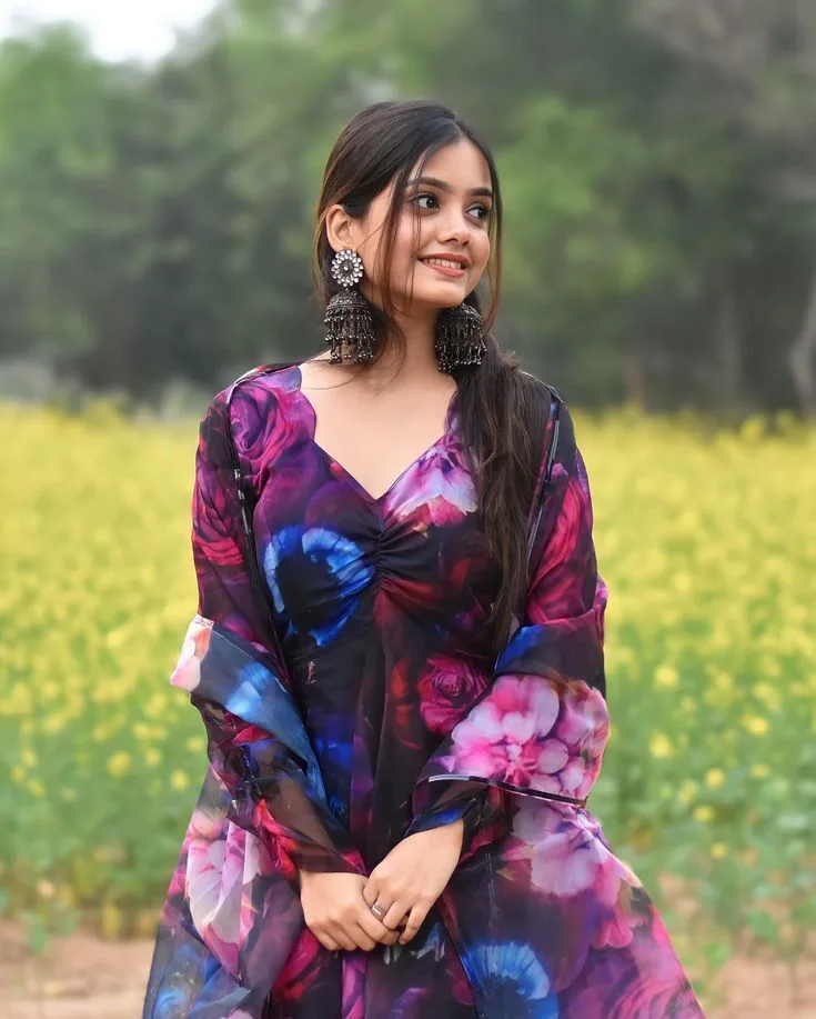 Candid Outdoor Meadow Portrait of Young Indian Woman in Floral Anarkali