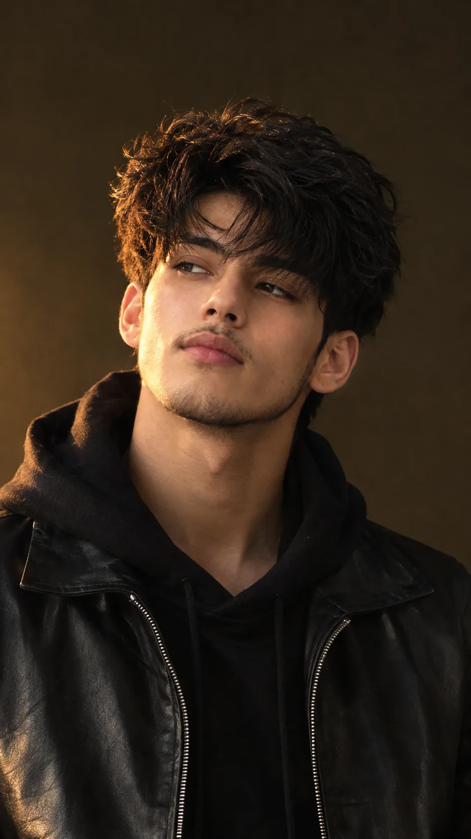 Cinematic Portrait of a Young South Asian Man in Black Leather Jacket