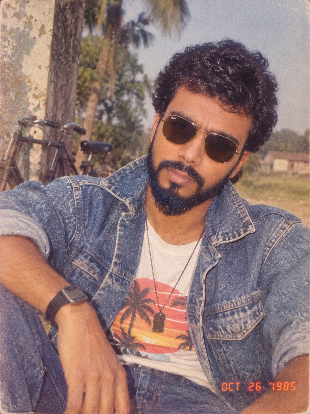 Using my uploaded photo, show me what I would have looked like around 1985.
