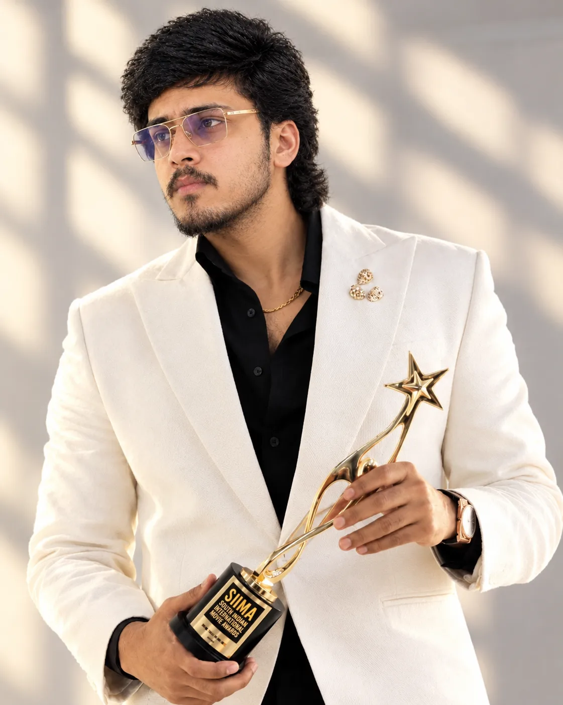 Create an ultra-realistic, premium award-ceremony portrait of a stylish young man wearing a sophisticated white textured blazer over a