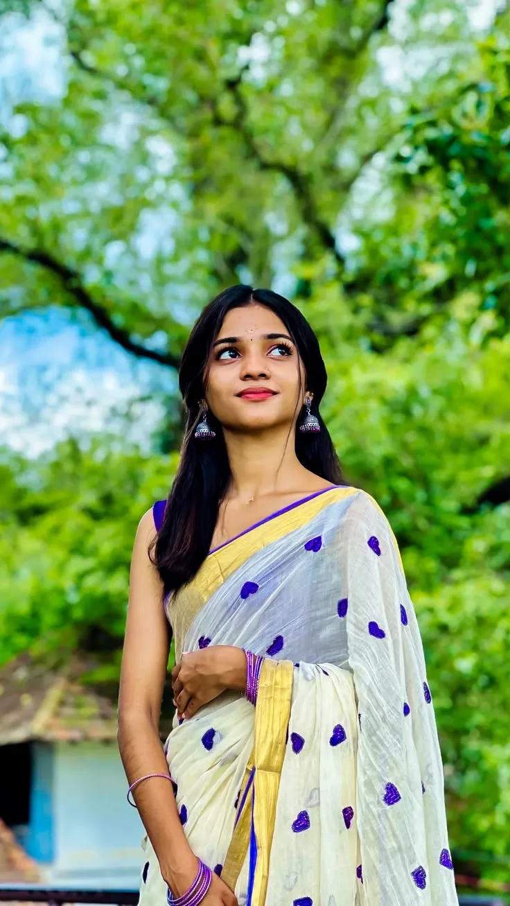 A photorealistic vertical medium shot of the young Indian woman from the reference image, faithfully preserving her recognizable facial