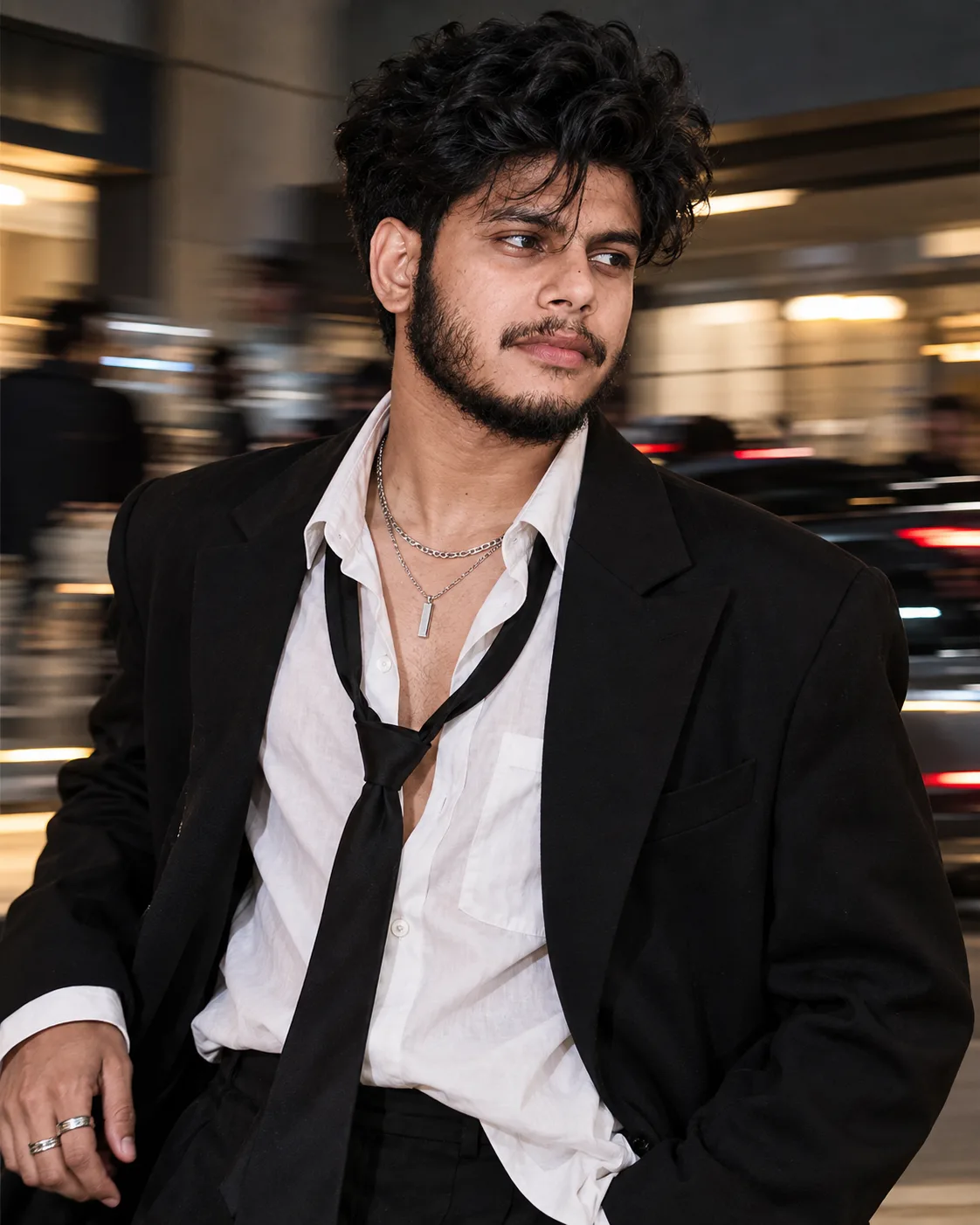 Ultra-realistic cinematic fashion portrait of the same young man from the reference image, with STRICT IDENTITY LOCK — preserve his exact