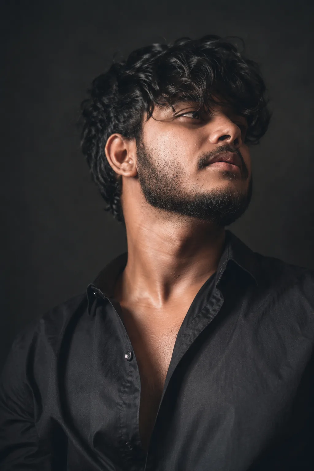 Ultra realistic luxury editorial fashion wallpaper, masterpiece quality, cinematic half body portrait of an exceptionally handsome young