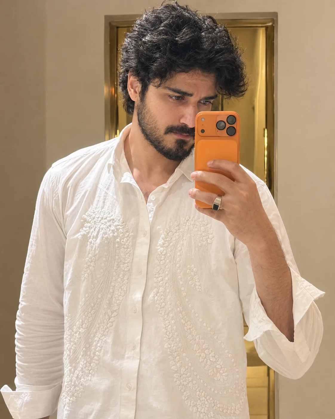 Create an ultra-photorealistic luxury mirror selfie matching the reference image as closely as possible.