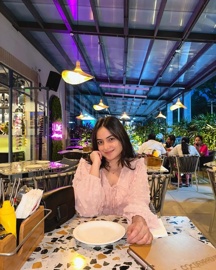 { "photo_design": { "style": "realistic cozy luxury restaurant portrait", "format": "vertical lifestyle portrait", "aspect_ratio": "4:5",