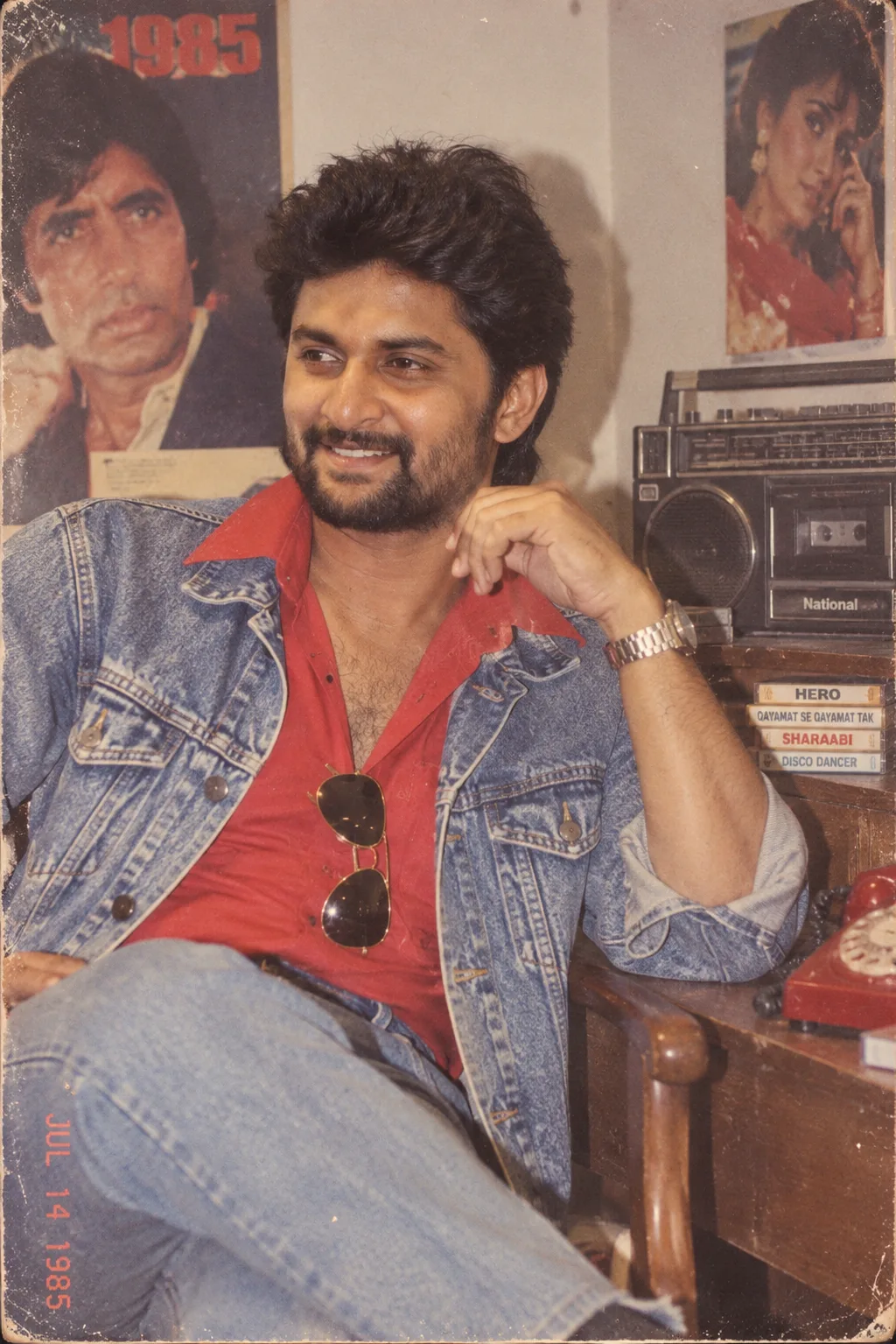 Using my uploaded photo, show me what I would have looked like around 1985.