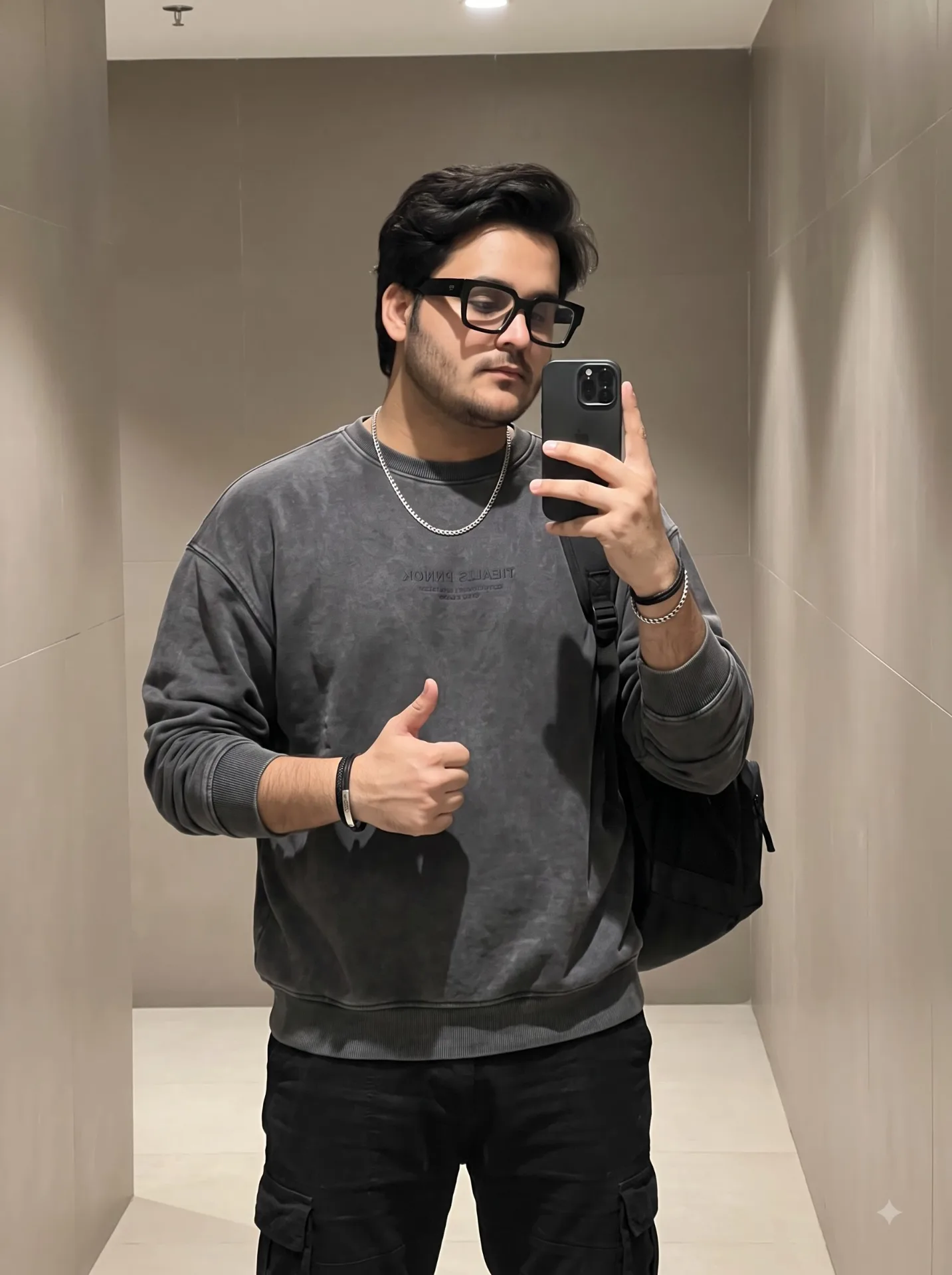 Create an ultra-realistic, premium streetwear mirror-selfie portrait of a young male in a modern minimalist interior.