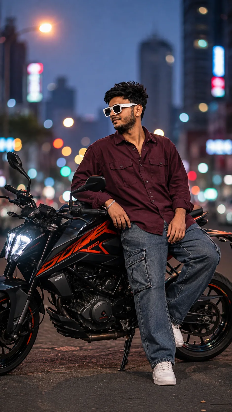 Create a highly realistic, cinematic full-body portrait of a stylish young Indian man sitting casually on a modern black-and-orange naked