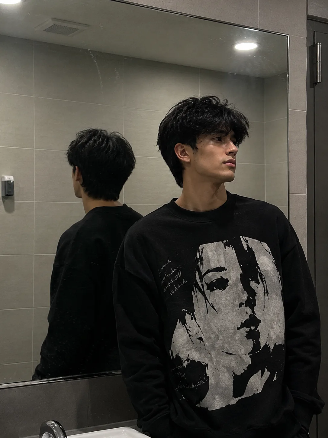 Visual Style: Ultra-realistic mirror photography × minimalist streetwear editorial × moody indoor portrait × contemporary youth fashion ×