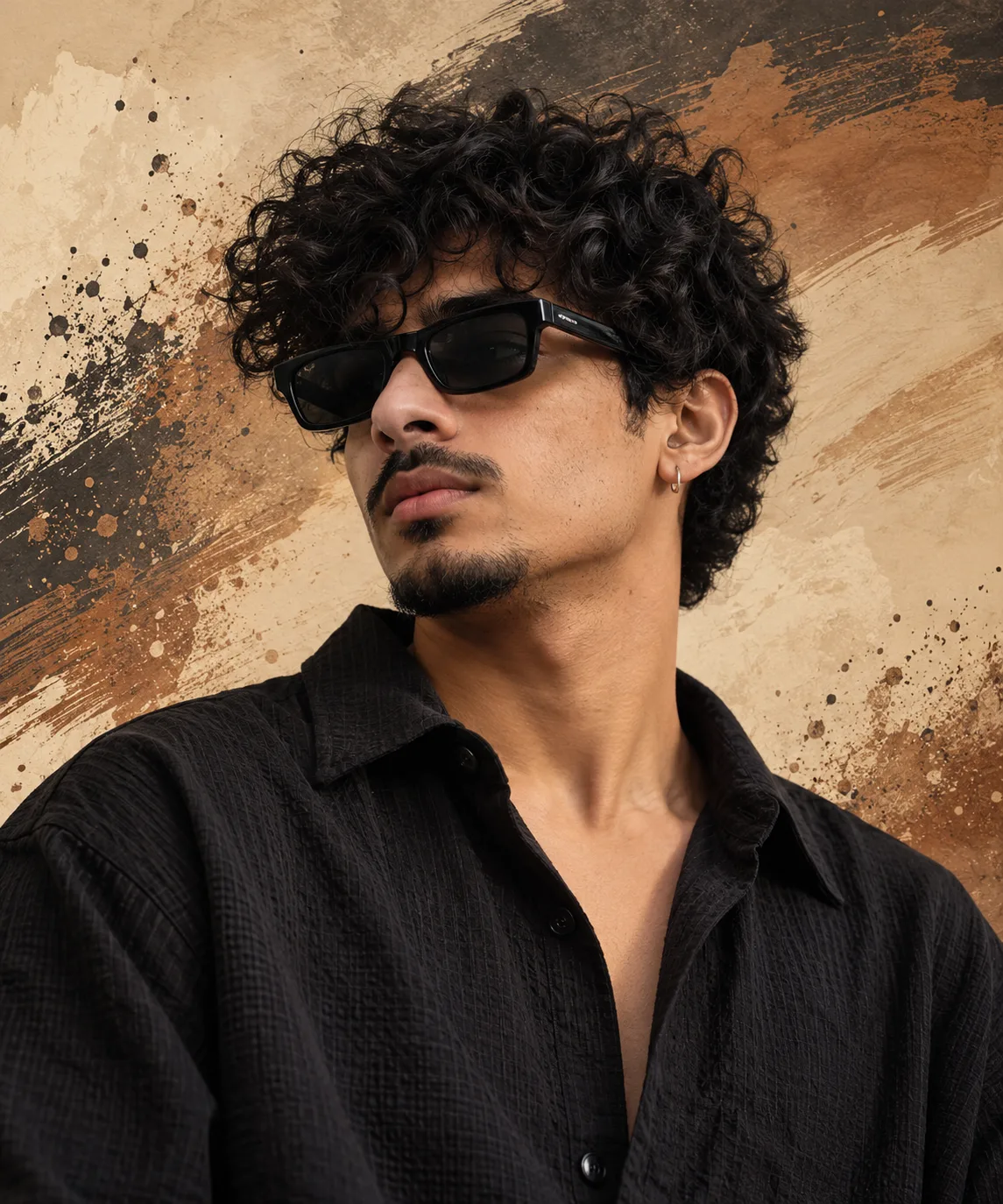 A cinematic portrait of a young man with messy curly hair, wearing black rectangular sunglasses, a small hoop earring, and a trimmed