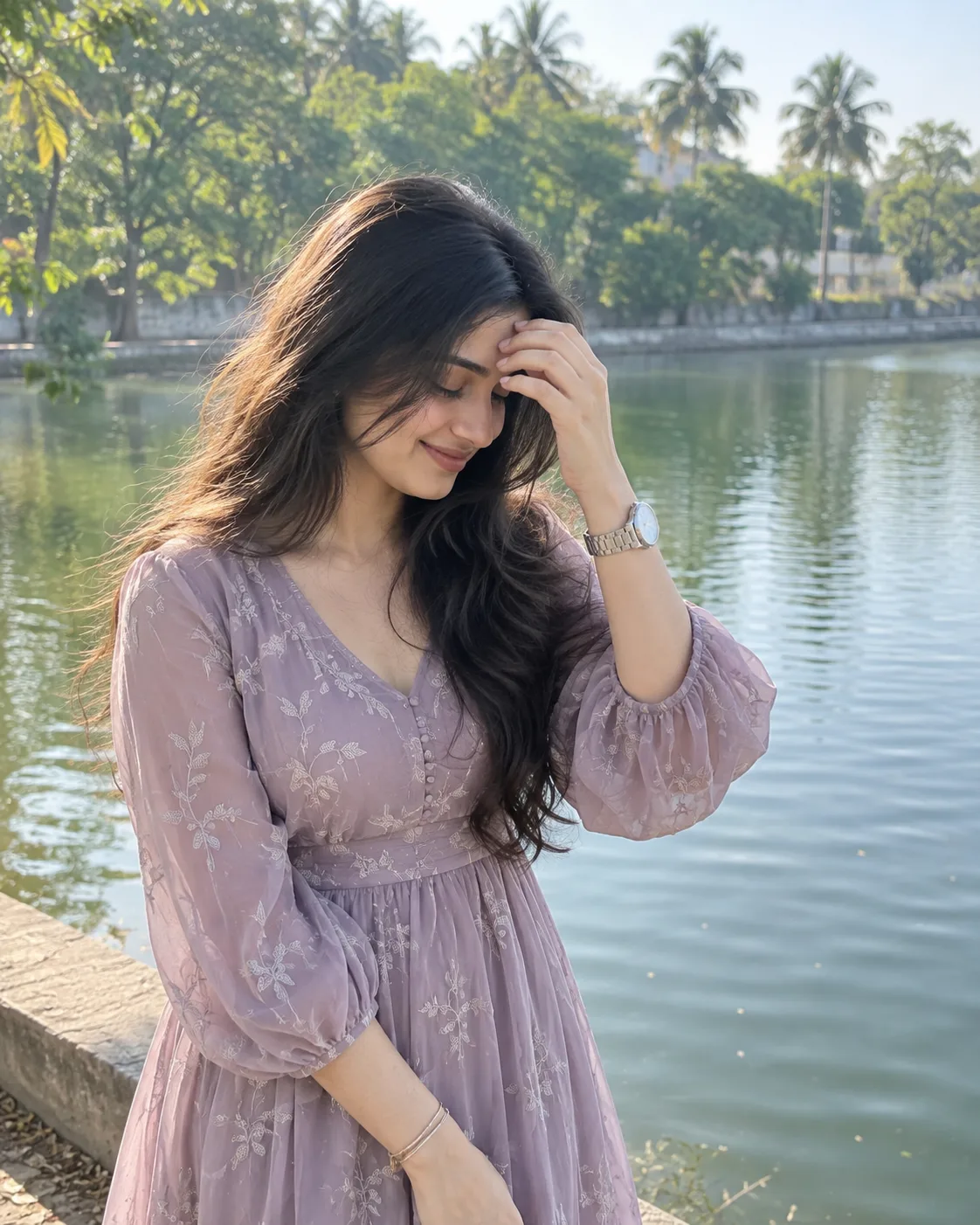 Create a photorealistic, natural outdoor portrait of a young Indian woman with long, dark, naturally flowing hair, standing casually beside