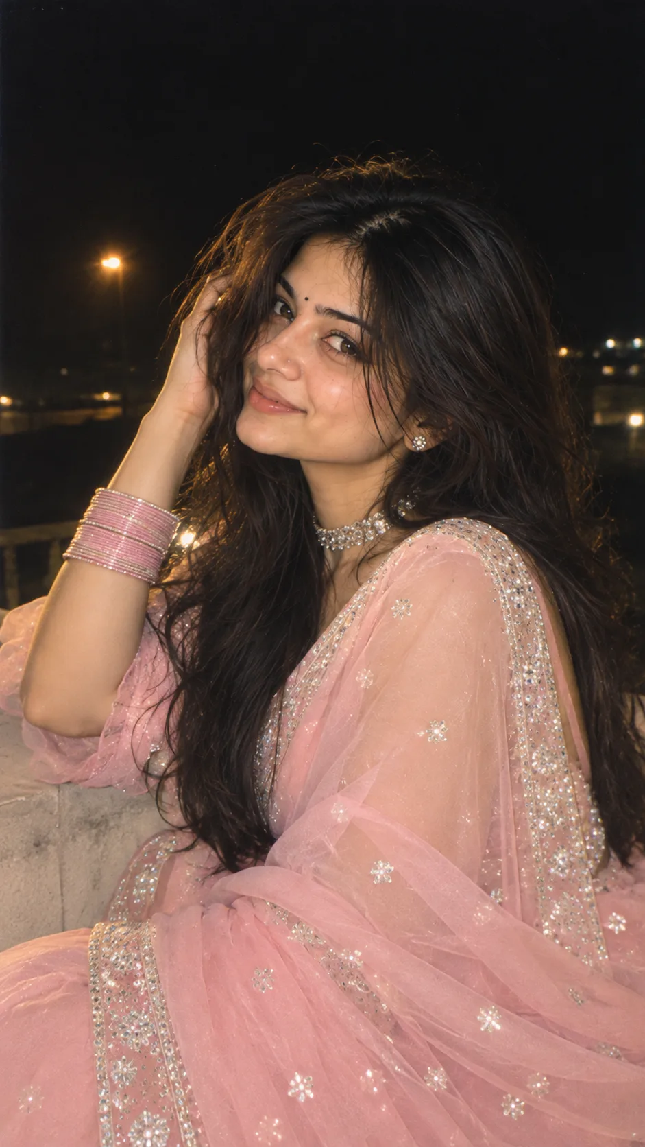 Prompt π€π«β₯β¦π A soft-focus, nighttime aesthetic portrait of a young Indian woman smiling softly.