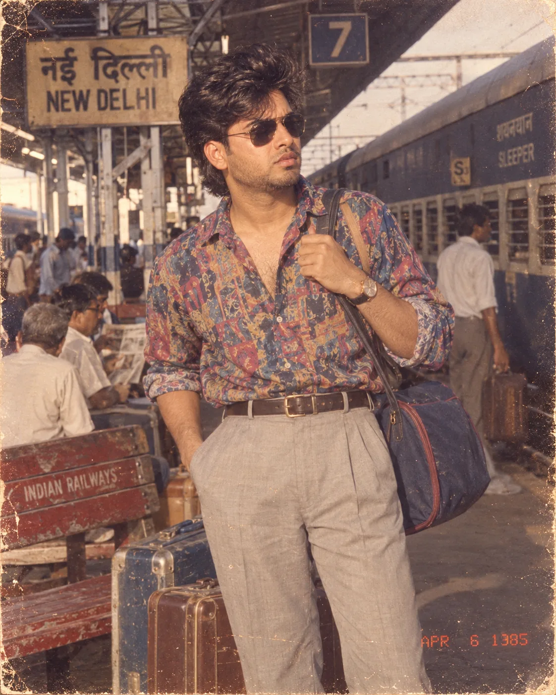 Using my uploaded photo as the primary identity reference, recreate me standing at an Indian railway station around 1985.