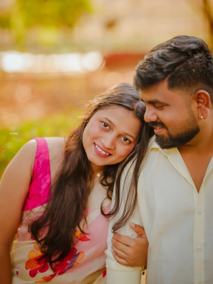 A photorealistic vertical full-length shot in 3:4 aspect ratio capturing the young South Asian couple from the reference images in an