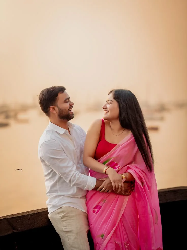 A photorealistic vertical medium shot in 3:4 aspect ratio capturing the young South Asian couple from the reference series standing