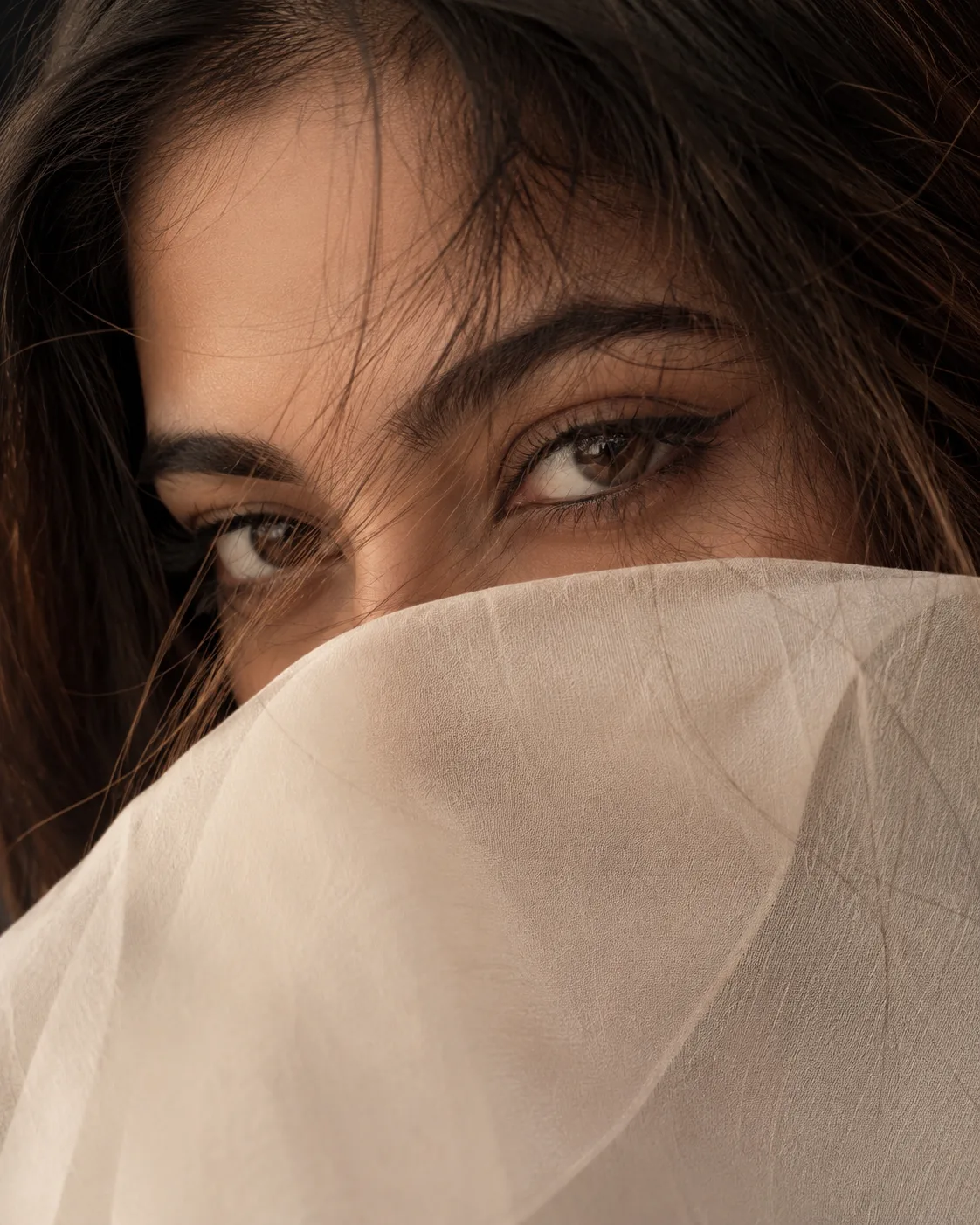 Prompt : Create an ultra-realistic, cinematic extreme close-up portrait of a beautiful South Asian woman face only.