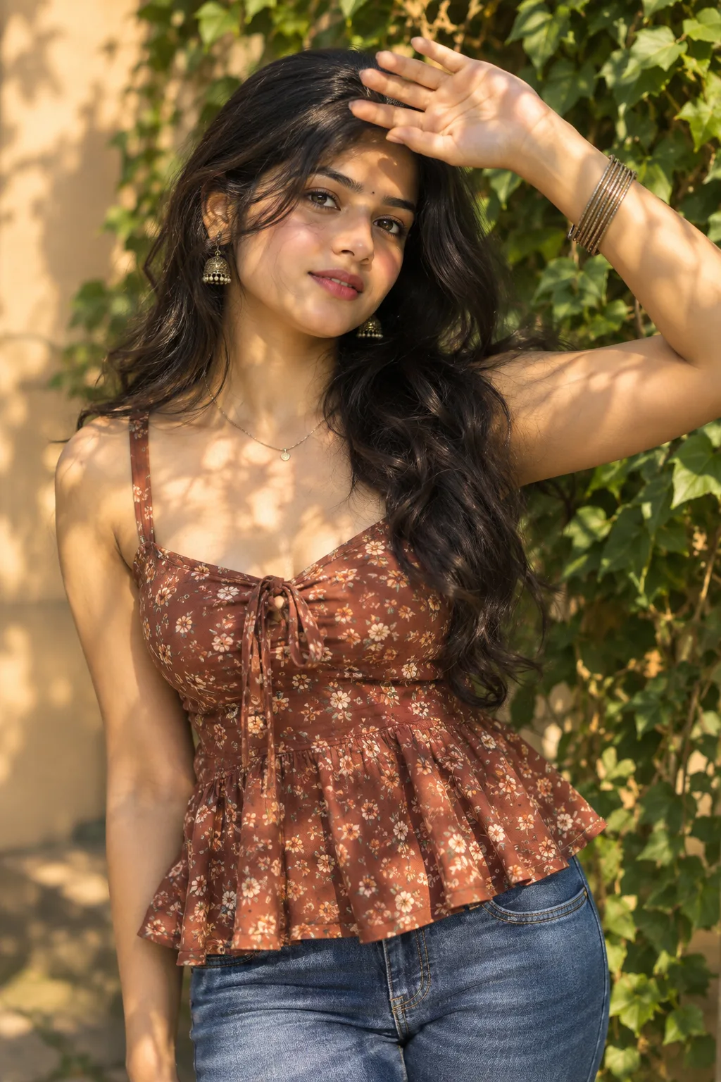 Create image A beautiful young South Asian woman posing outdoors during golden hour, wearing a brownish-rust floral sleeveless peplum top