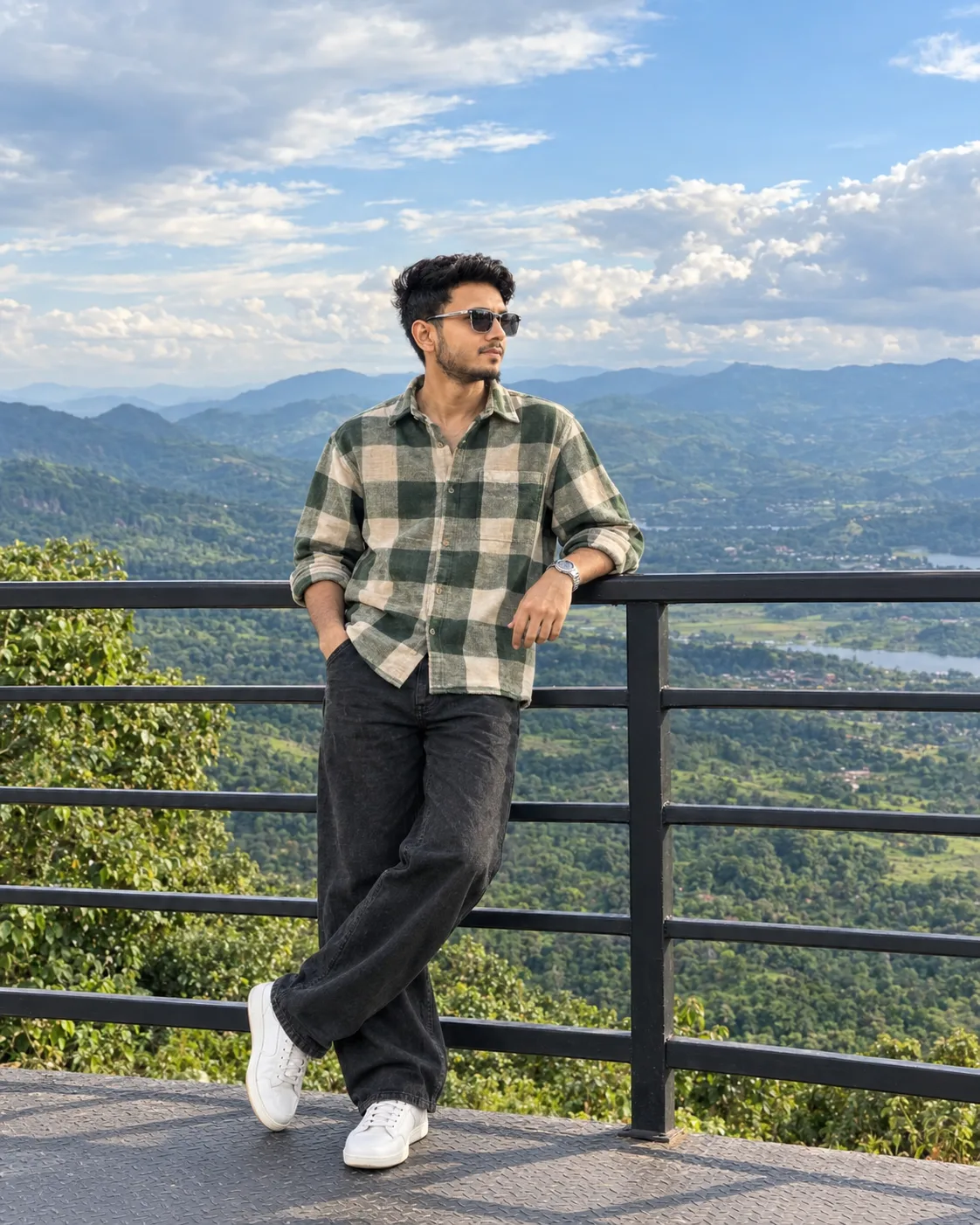 > Create a highly realistic vertical 4:5 cinematic travel-fashion photograph of a young man standing casually on a modern black metal
