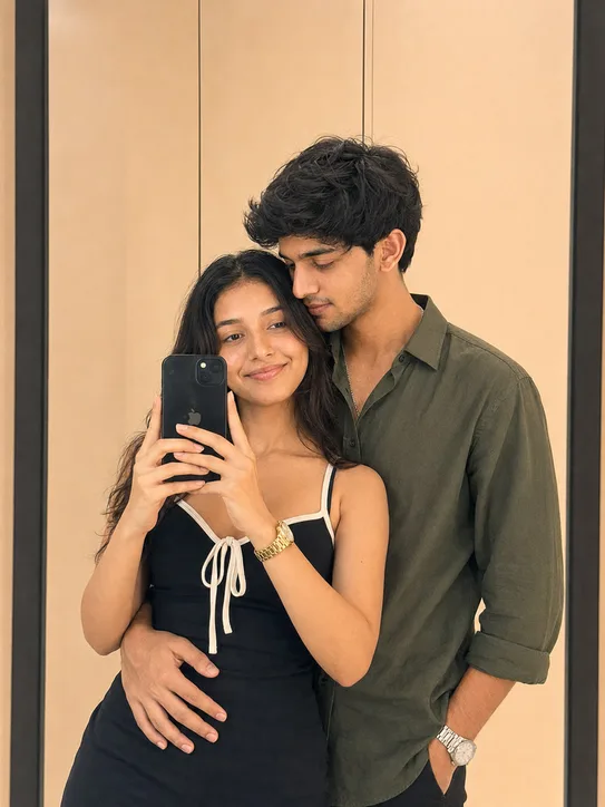 Using the provided reference image of the couple, create a premium modern romantic mirror-selfie portrait while preserving the exact same