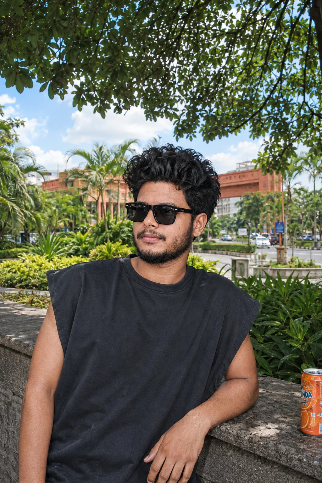 Create an ultra-photorealistic, high-end summer fashion editorial portrait of a young male standing outdoors in a lush tropical urban