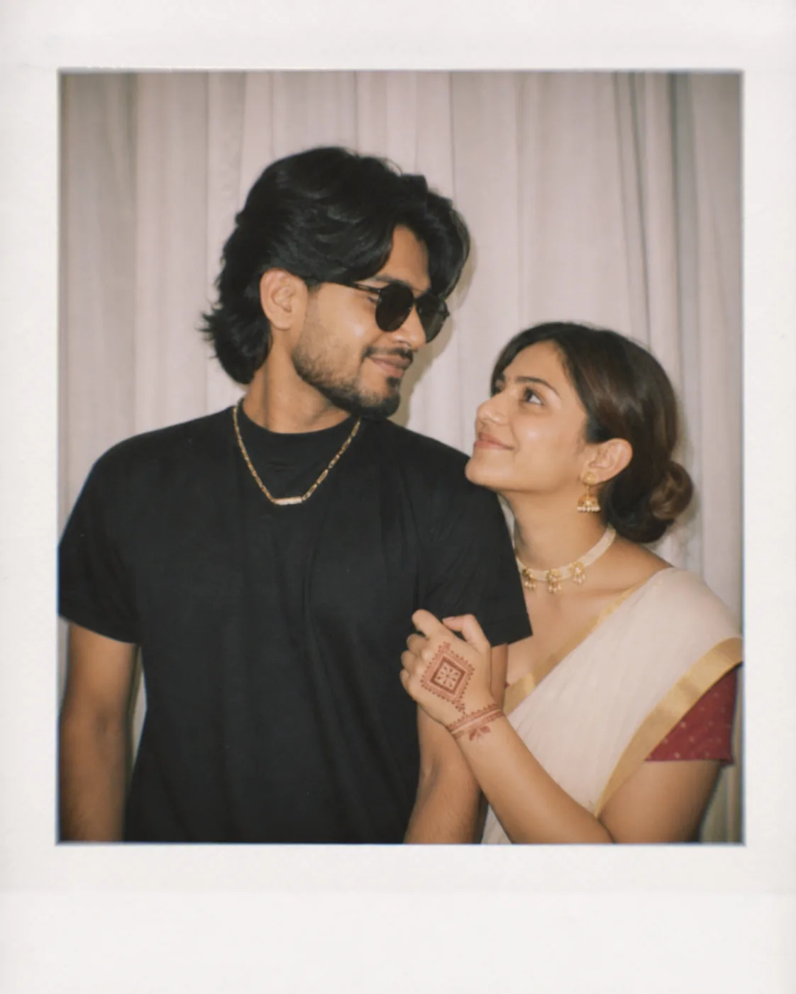 Detailed Prompt: A candid vintage Polaroid photograph of a stylish young South Asian couple standing close together indoors.