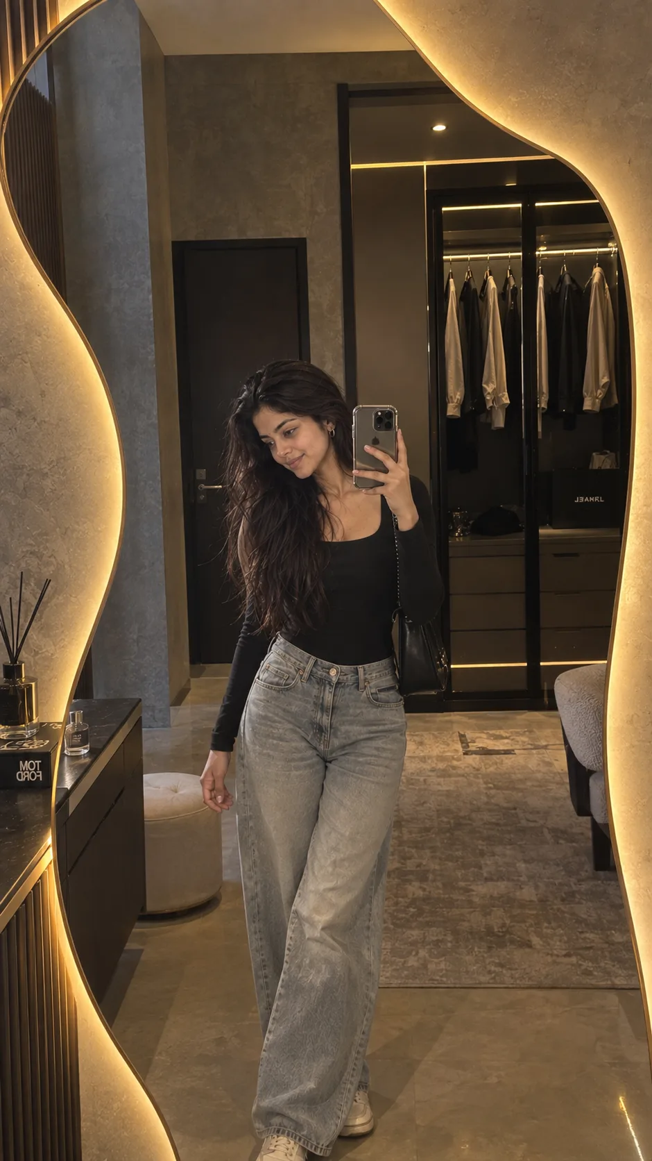 Create an ultra-realistic luxury mirror selfie in 9:16 vertical format, using the uploaded image as the ONLY facial identity reference.