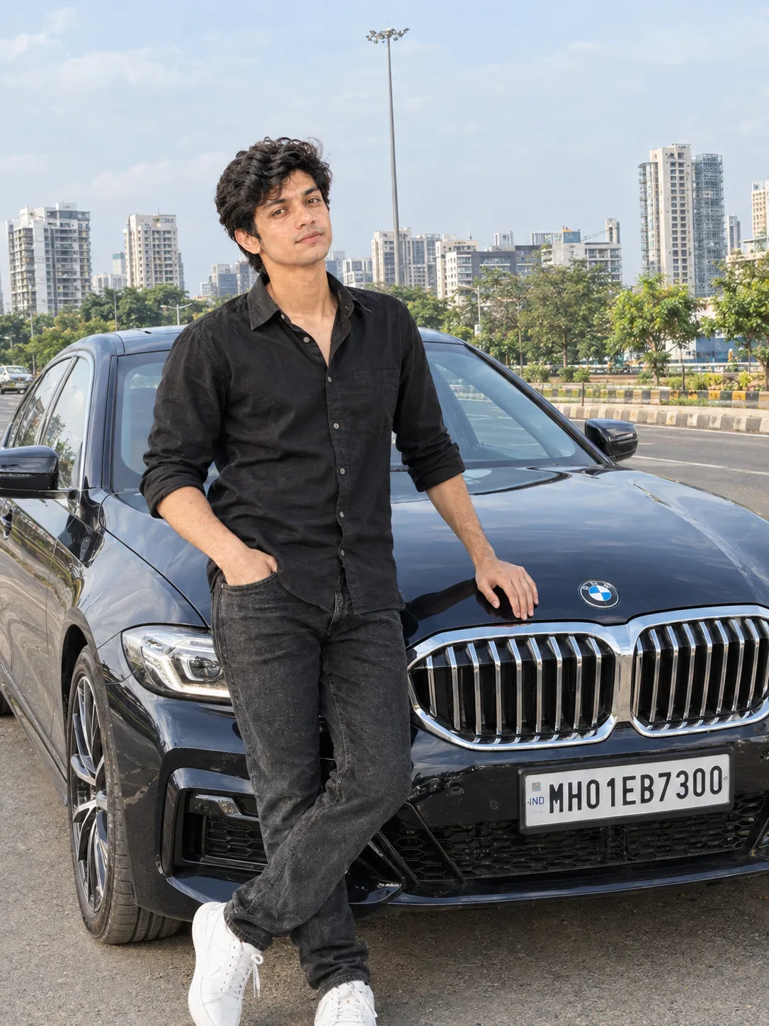 Ultra realistic photograph of a young man standing next to a BMW car during daytime, shot on a real DSLR camera.