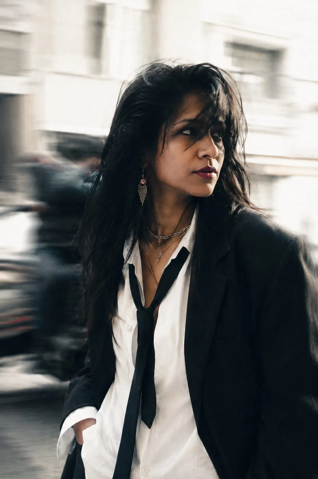 Create a photorealistic, 8K ultra-detailed, DSLR cinematic street fashion portrait.