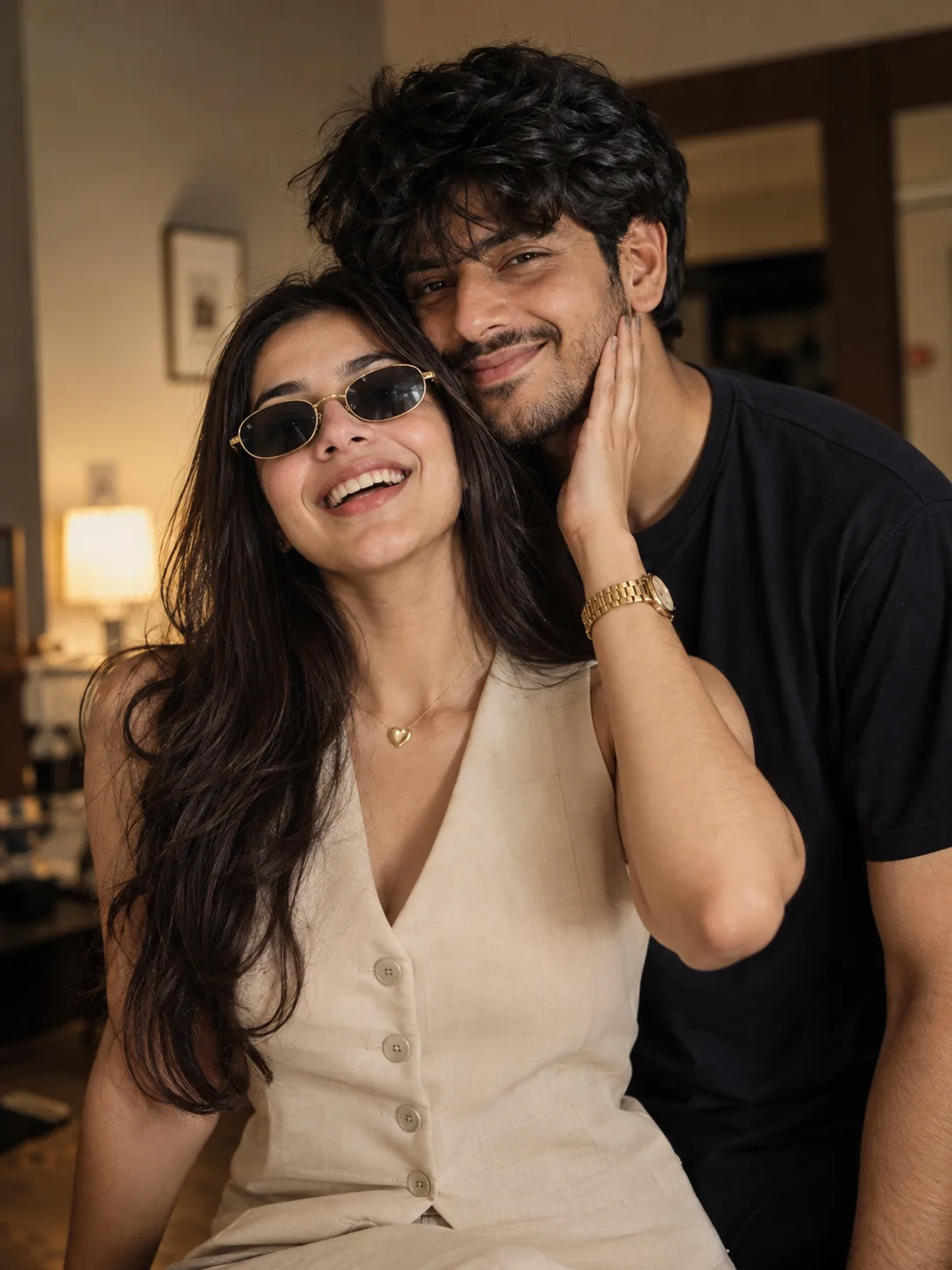 Arealistic, canala pnotograpn of a s tylish young Indian couple smiling b rightly.
