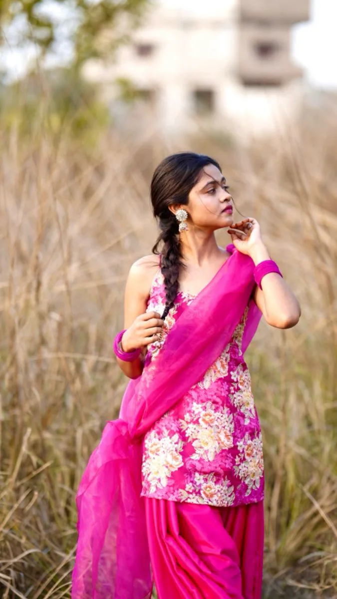 Candid Outdoor Golden Hour Portrait of Indian Woman in Pink Patiala Suit