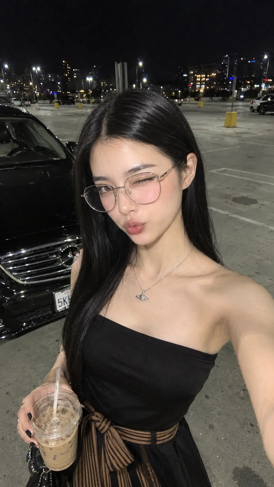 Prompt Ultra-realistic high-resolution nighttime smartphone selfie of a young woman, using the uploaded reference image as the exact face
