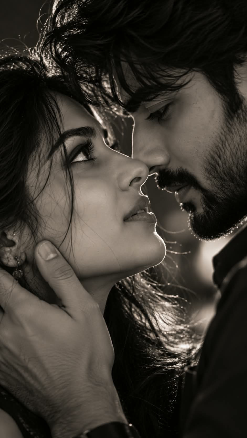 Create an extreme close-up cinematic black-and-white portrait of a young South Asian couple, with their faces dominating the entire