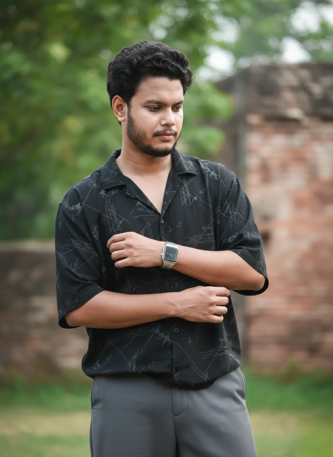 A hyper-realistic, professional portrait of a 26-year-old South Asian man with a height of 5 feet 5 inches, featuring a clean facial
