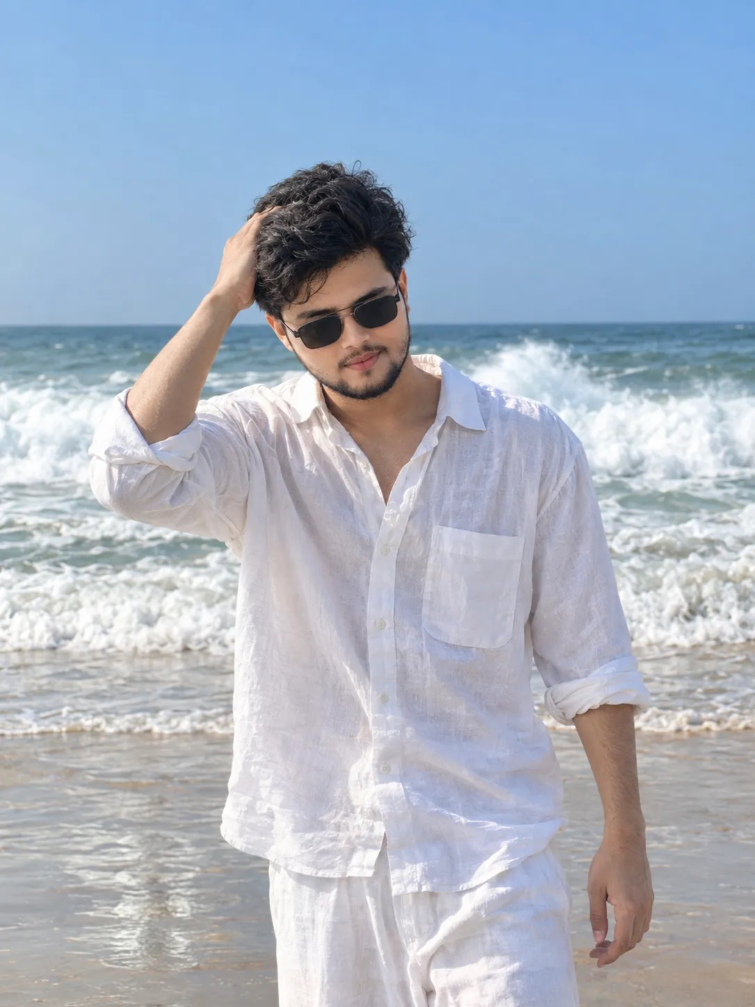 Photorealistic full-body portrait of a young South Asian man in his mid-20s with stylish black hair and a light beard and, wearing black
