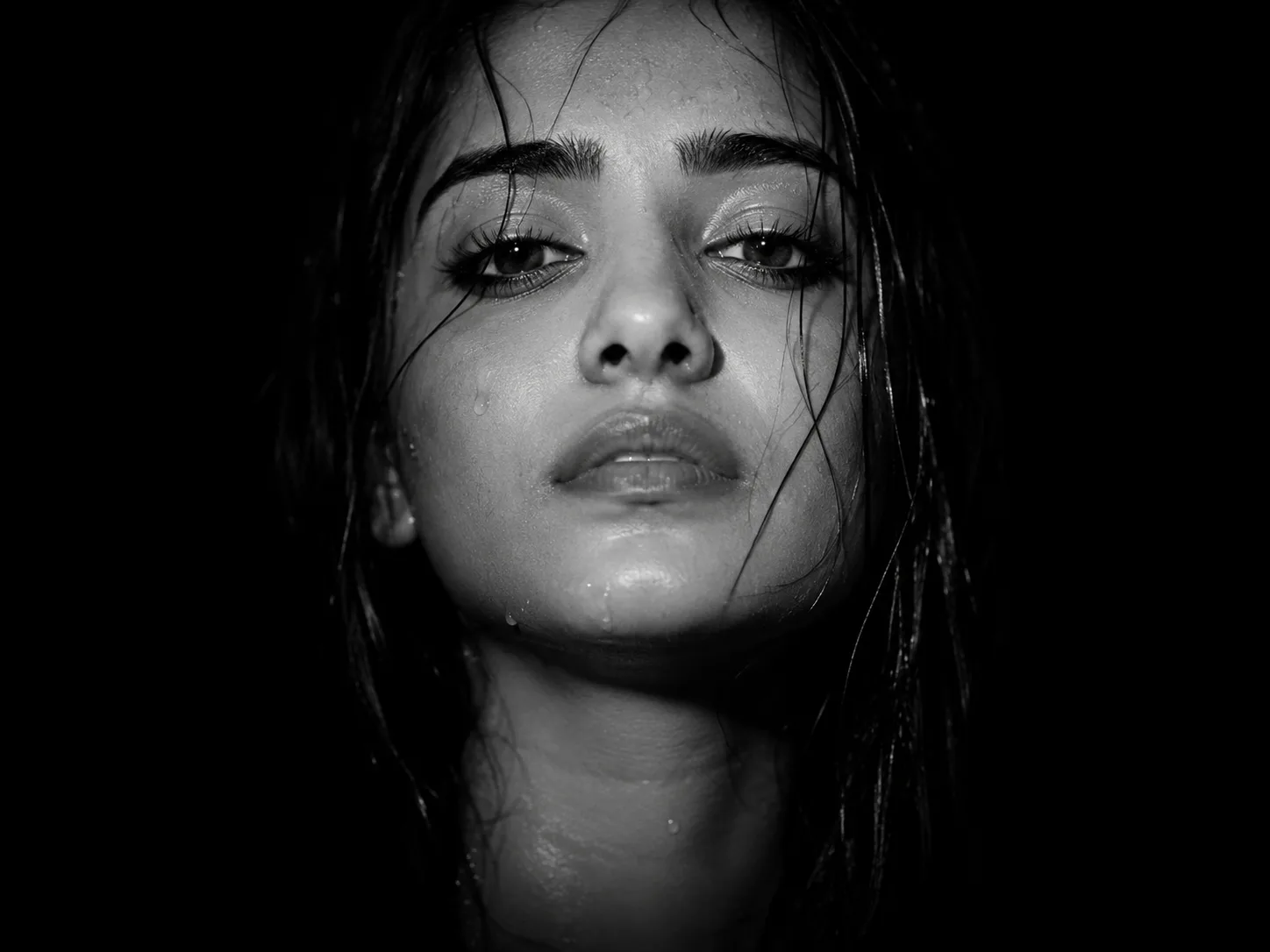 Without changing my facial features, but just adding lashes, create a high contrast close portrait of my face focusing on front head, in