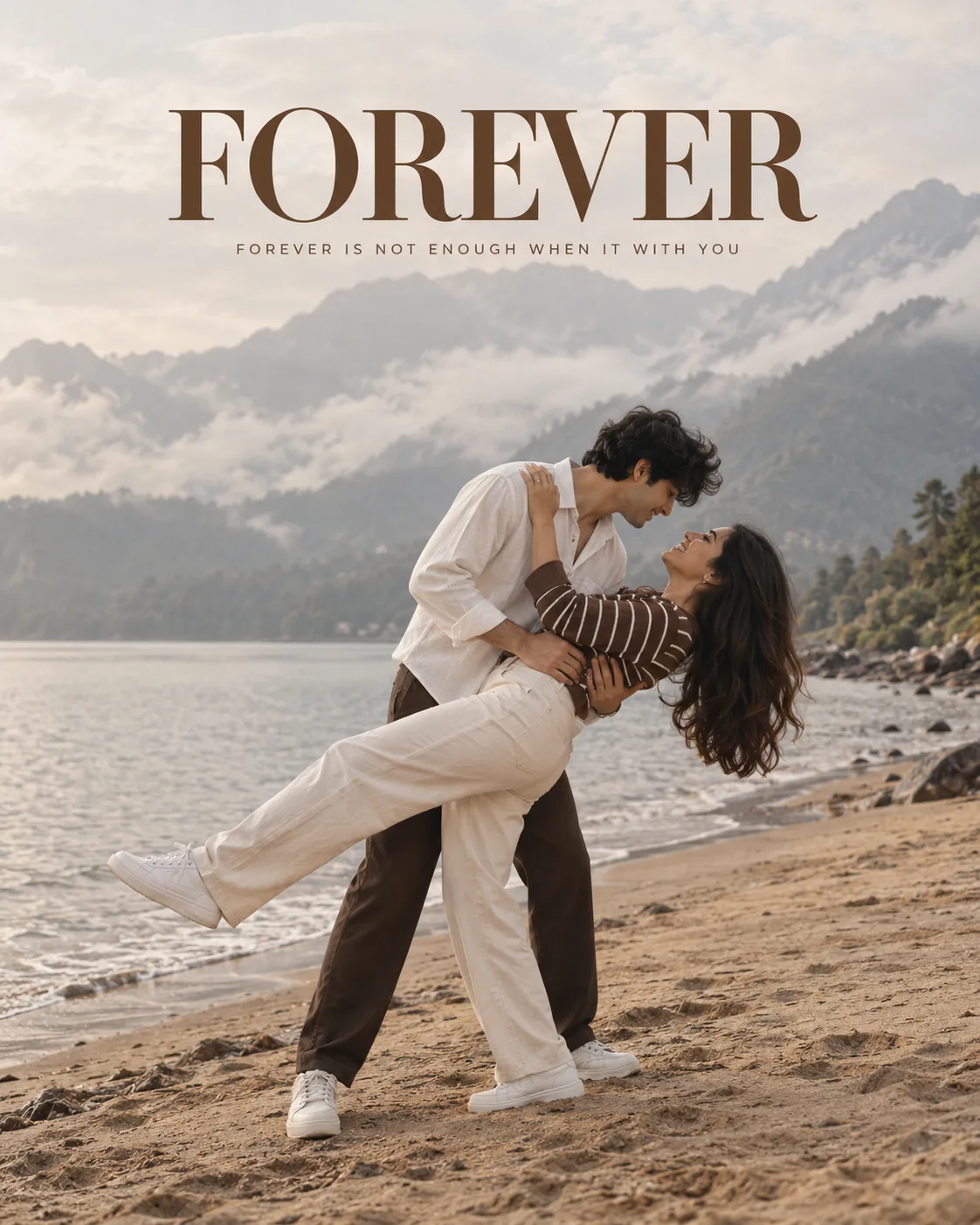 HIGH-RESOLUTION ROMANTIC PORTRAIT OF A YOUNG COUPLE POSING DYNAMICALLY ON A SANDY BEACH SURROUNDED BY MISTY MOUNTAIN HILLS IN THE