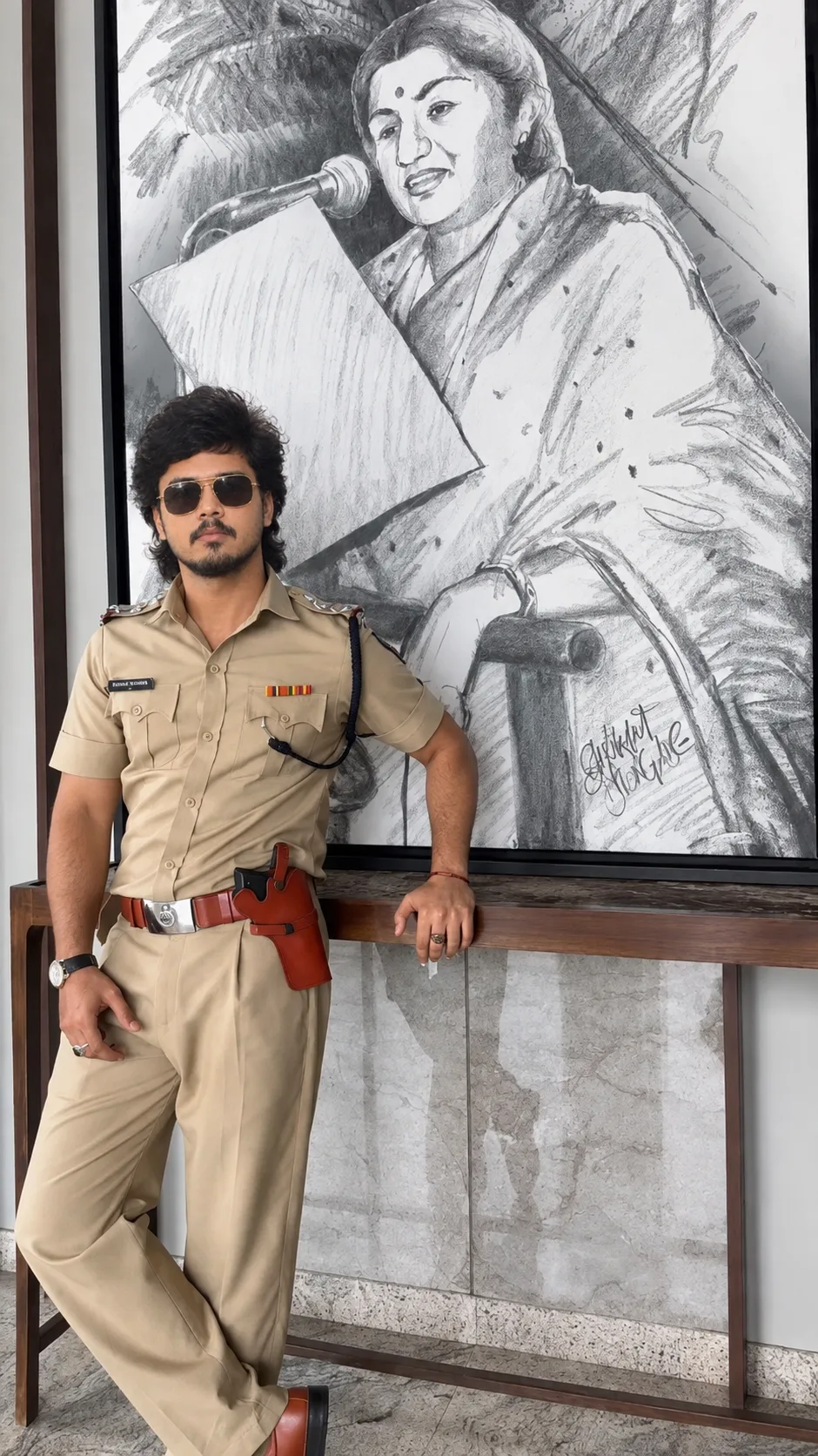 Create an ultra-realistic, cinematic vertical portrait of the same young South Asian man wearing a crisp khaki Indian police-style uniform,