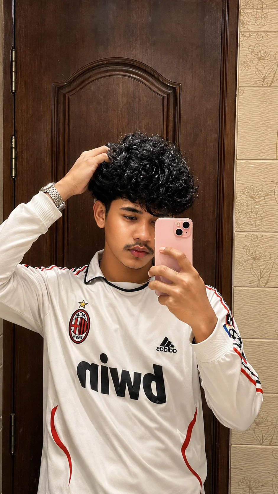 Use my uploaded photo as the ONLY reference for the person’s identity and facial appearance.
