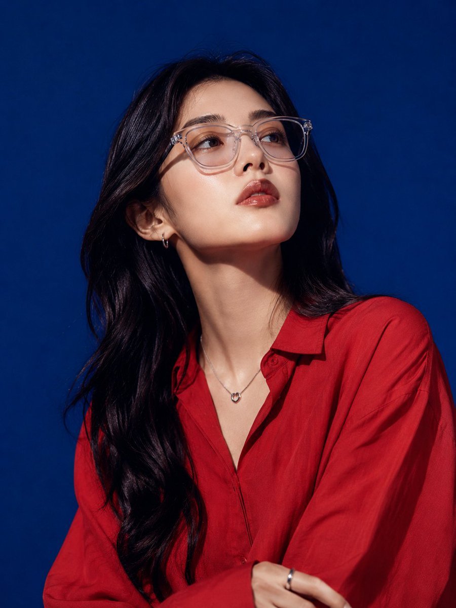 Created with GPT Image 2.0 on ChatGPT Prompt: Ultra-realistic high-fashion studio portrait of a beautiful young East Asian woman with long