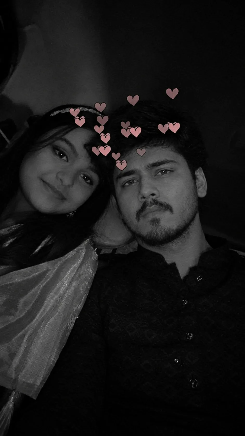 Create an ultra-photorealistic black-and-white intimate couple selfie, matching the reference image as closely as possible.