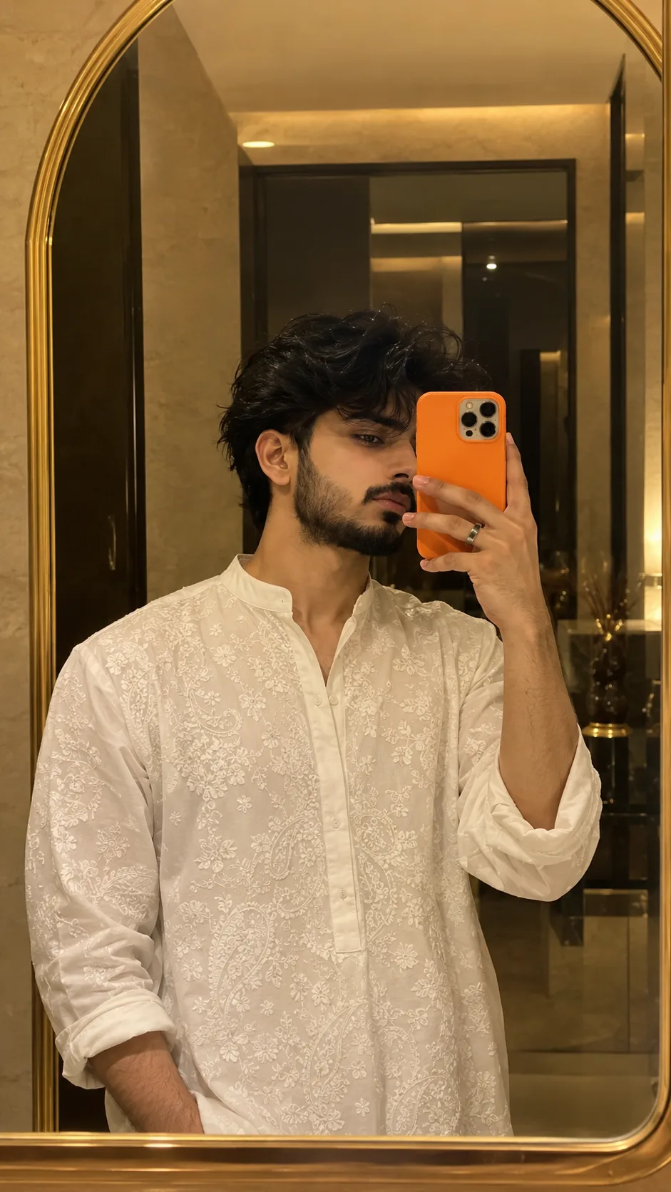 Create an ultra-photorealistic luxury mirror selfie matching the reference image as closely as possible.