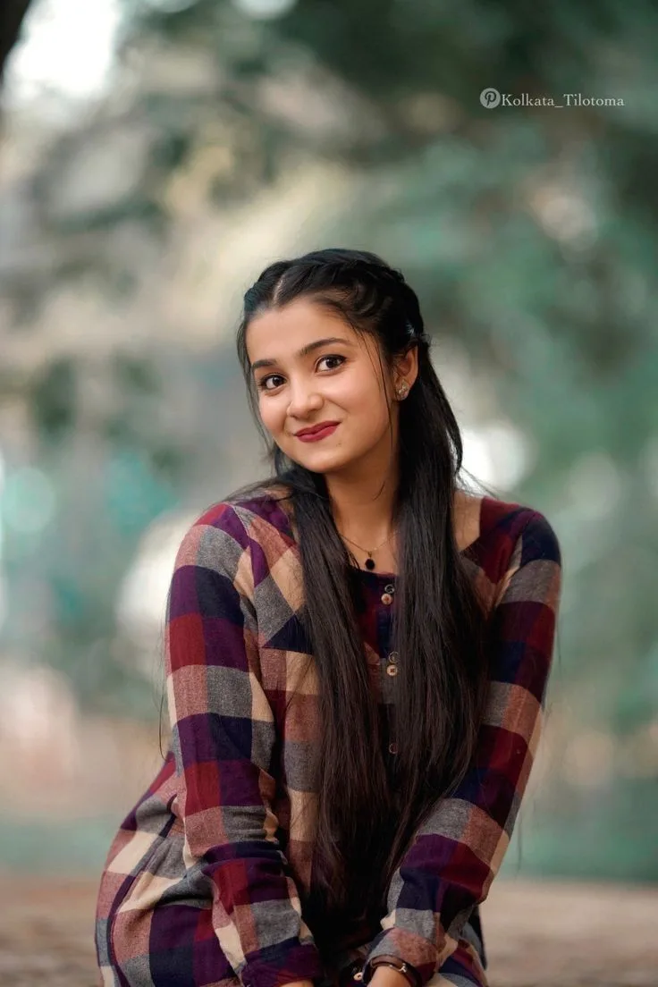 Candid Outdoor Portrait of Young Indian Woman in Plaid Kurti