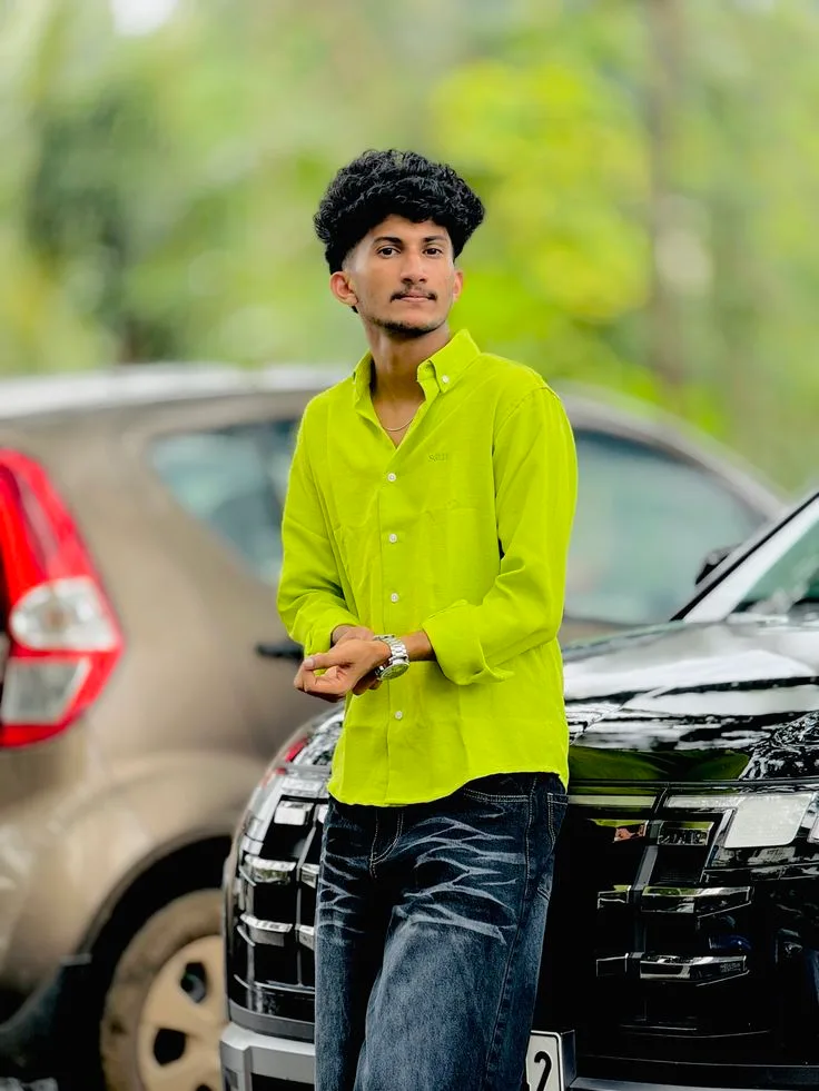 A photorealistic vertical medium-three-quarter shot in exact 3:4 aspect ratio capturing the young South Asian man from the reference image