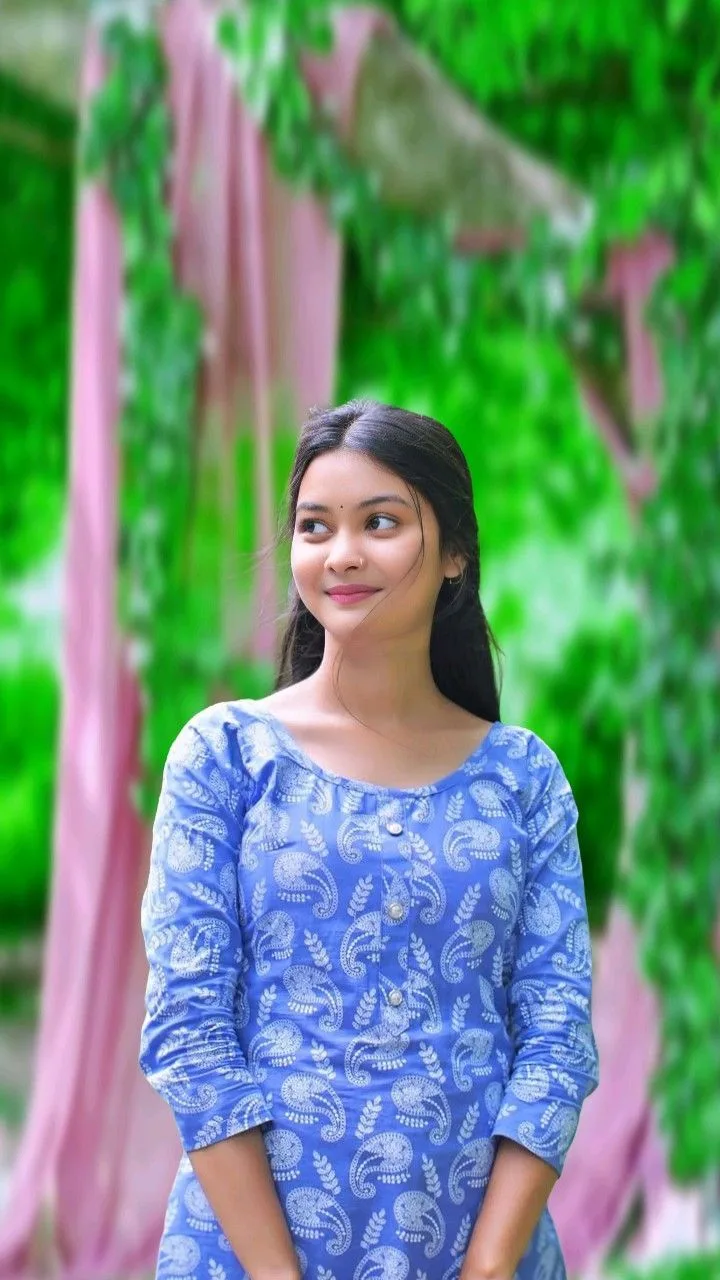 Candid Outdoor Portrait of Indian Woman in Blue Paisley Kurti